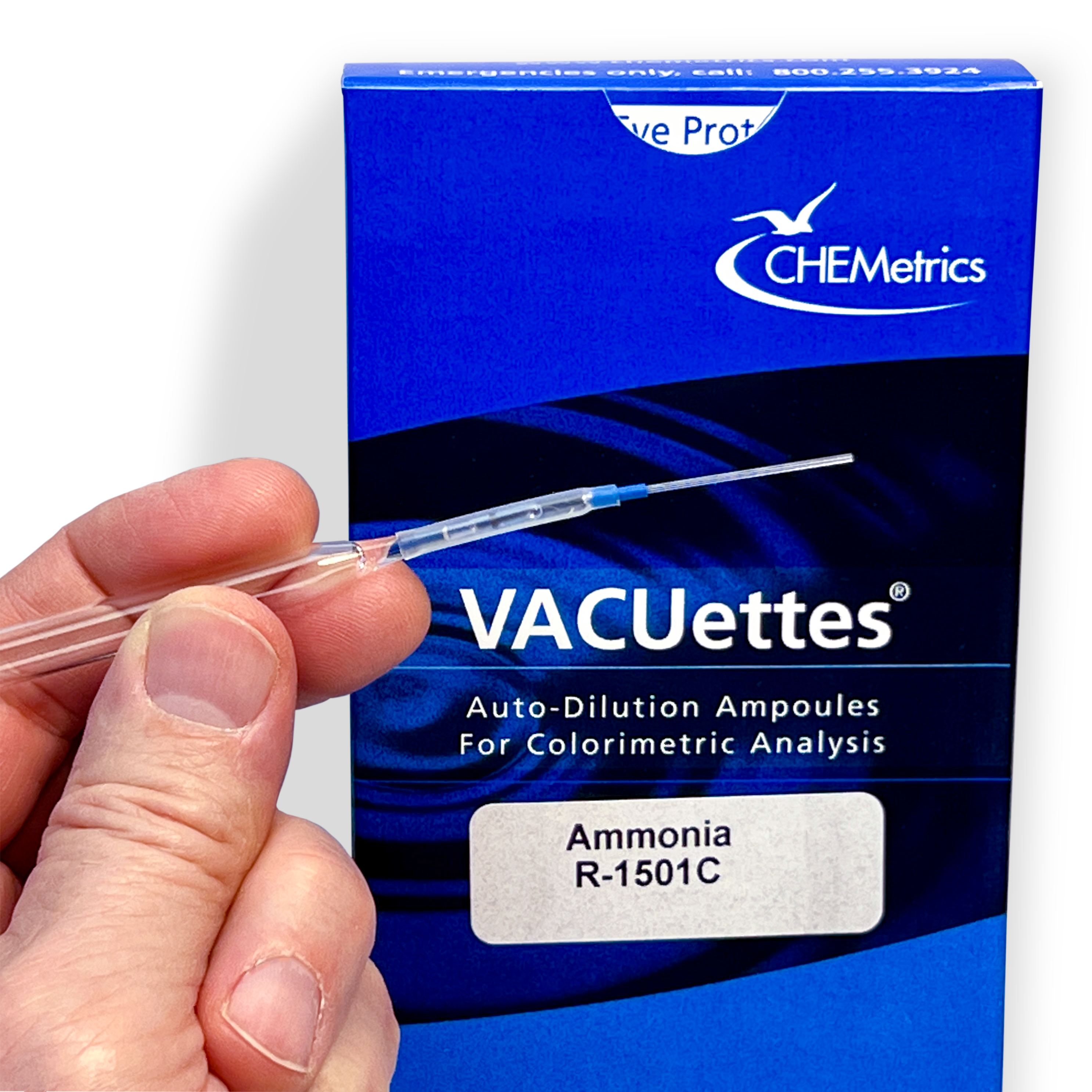 A hand holding A VACUettes ampoule with an R-1510C Ammonia box in the background.